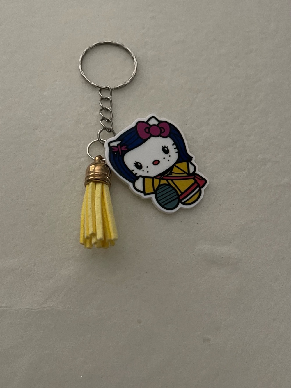 Cute Character Keychain with Yellow Tassel